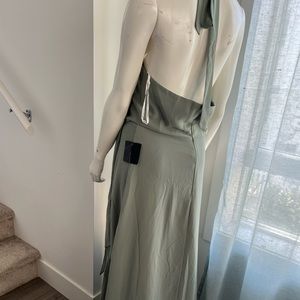 Sage green wedding guest dress. Halter neck, maxi with split